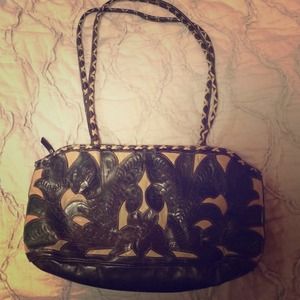 Leather cutout handbag
