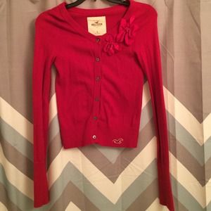 Gently worn red Hollister cardigan with flowers