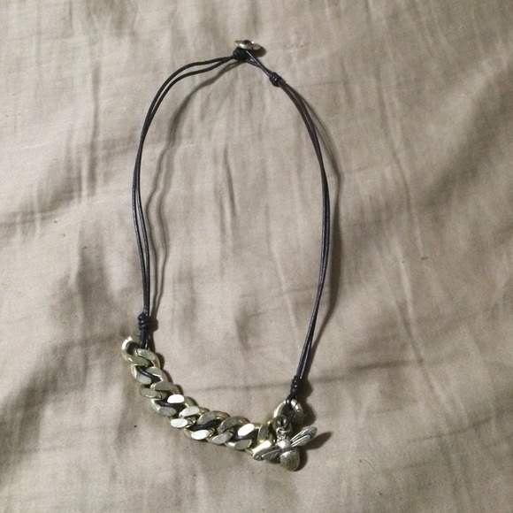 Gold & leather fossil neckless
