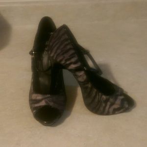 Zebra and purple high heels