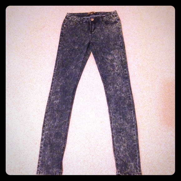 Blue acid washed high waisted jeans.
