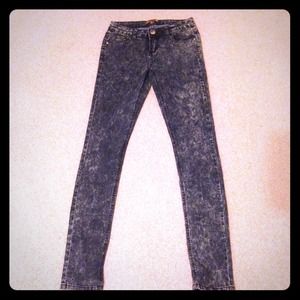 Blue acid washed high waisted jeans.