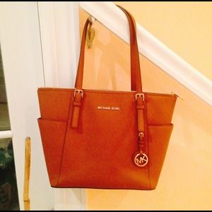 Brown leather and gold Michael Kors bag