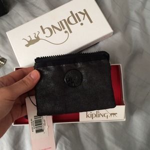 Brand new wallet w tags and key chain to match