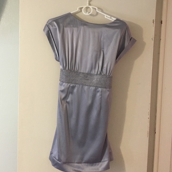 Silver dress with beaded waist.
