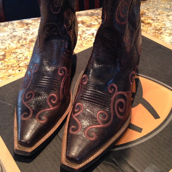She's country. Ariat boots