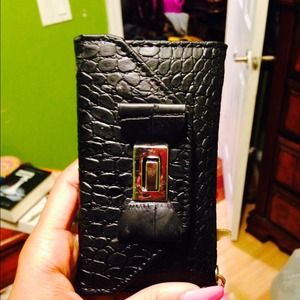 I'm selling a black case / money holder
