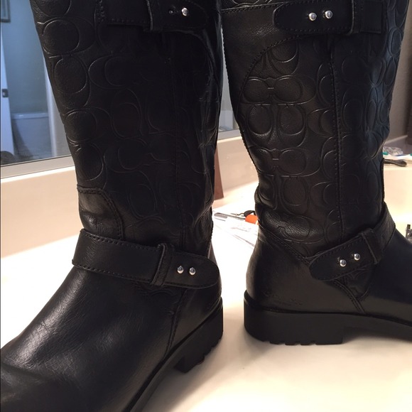 Black mid calf brand new Coach boots