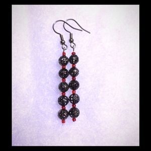 ($1) earrings