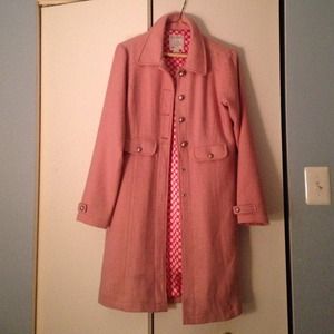 Coat with pink and white polka dot lining