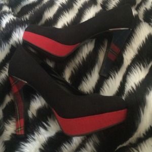 Black suede pumps with plaid heel detailing