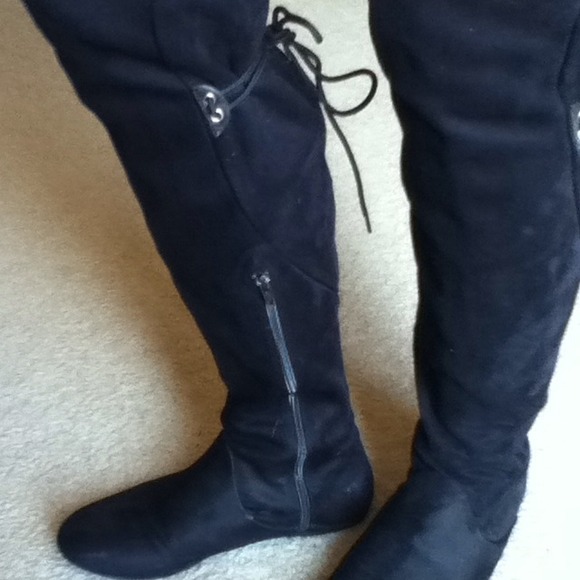 Black suede above the knee boots.