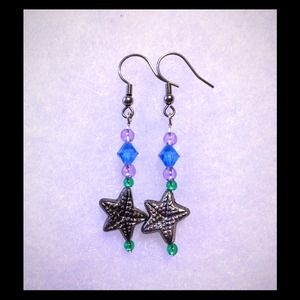 ($1) earrings