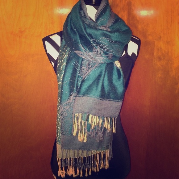 Soft turquoise scarf.