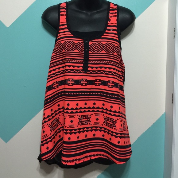 Never used. Bright orange/black Aztec top.
