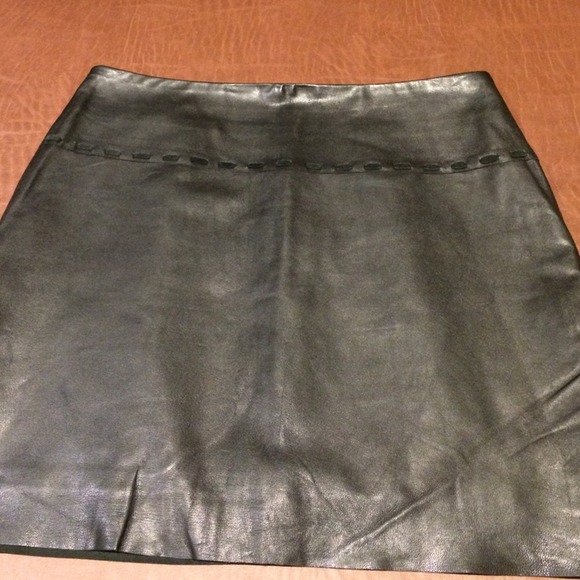 BCBG black 100% leather mini skirt.