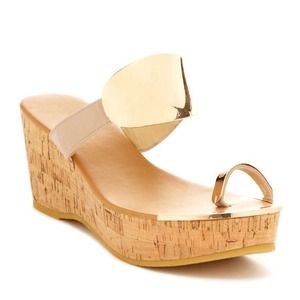 Bucco Carmine Platform Wedge Sandal.