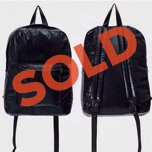 ‼️SOLD on vinted‼️aa shiny backpack in black