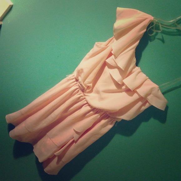 Peach colored one shoulder dress