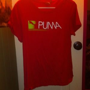 Short sleeve puma shirt.