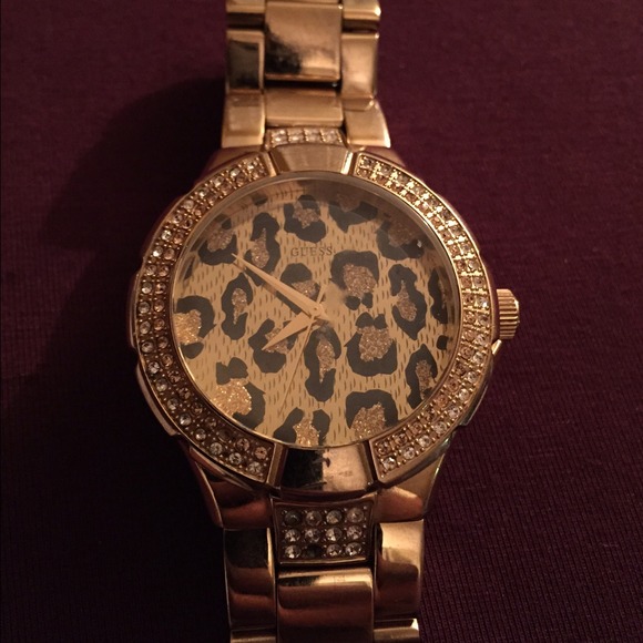 Gold cheetah guess watch, needs battery