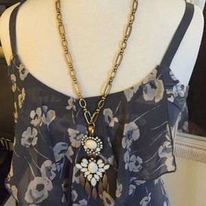 Long antique gold colored necklace