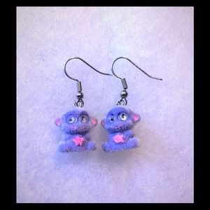 ($1) earrings