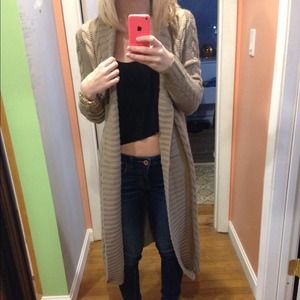 An calf length knit sweater / cardigan