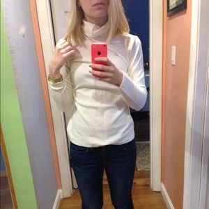 A cream colored turtleneck