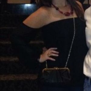 Black strapless with attached sleeves shirt