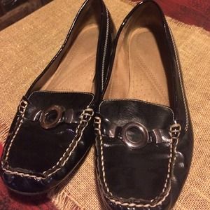 Naturalized patent black loafer flats