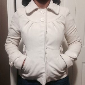 It is a beautiful short cream coat!!