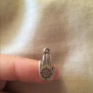 A charm! Great for necklaces and bracelets