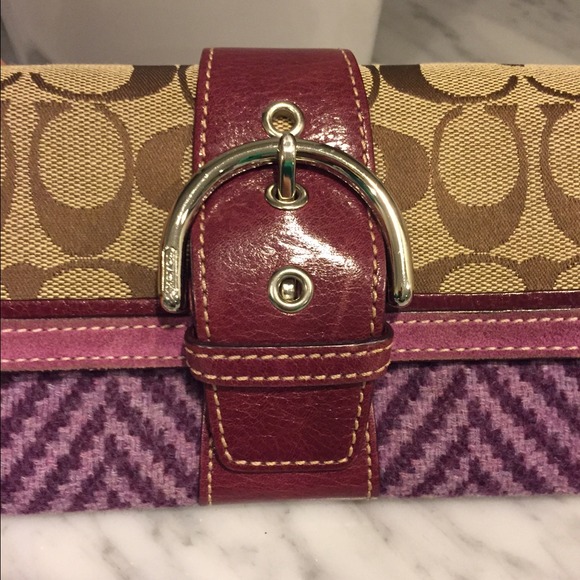 Coach clutch with suede trim