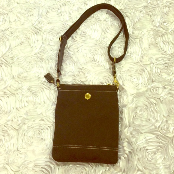 Sold w/ 🅿️🅿️. Authentic Coach black swing. - Picture 1 of 3