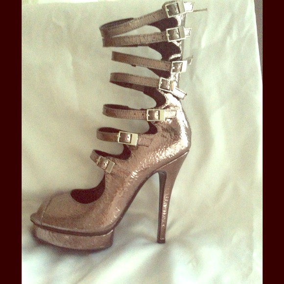 Bebe boots size 7 metallic in box excellent shape