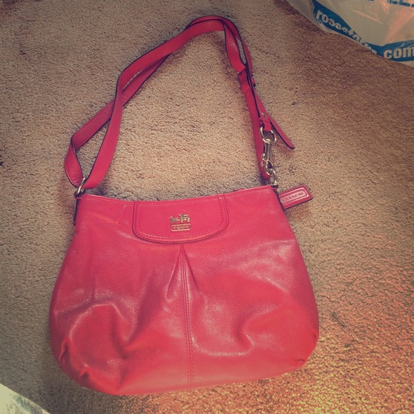 Pink bucket coach purse