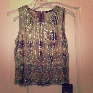 Beautiful cocktail top. Never worn. Great price!