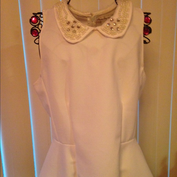 White Peplum Top