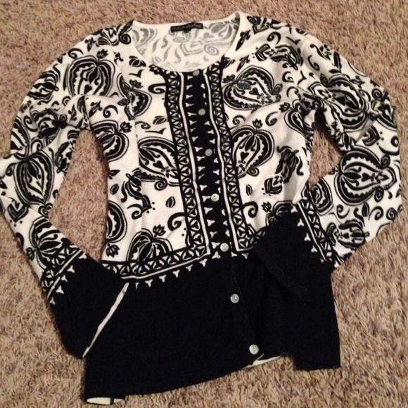 Beautiful sweater. Lightly worn.
