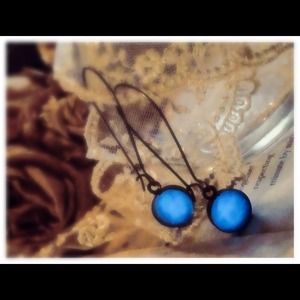 Glow in the dark blue earrings