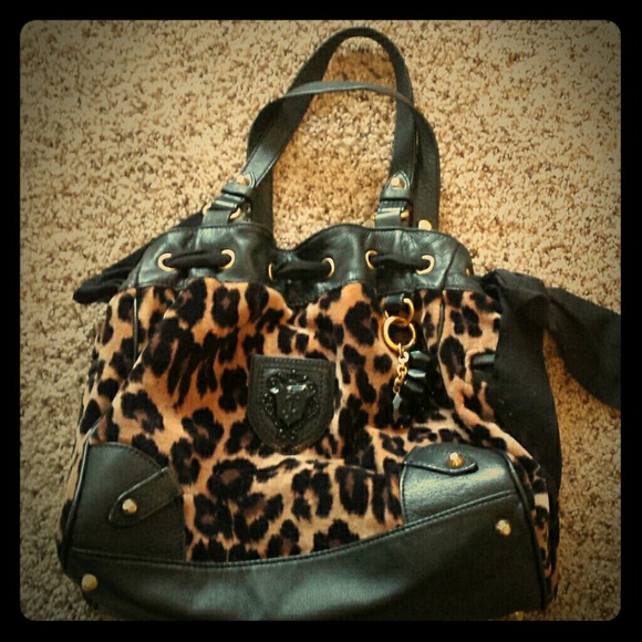 Juicy couture bag 14 inches about 8 in depth