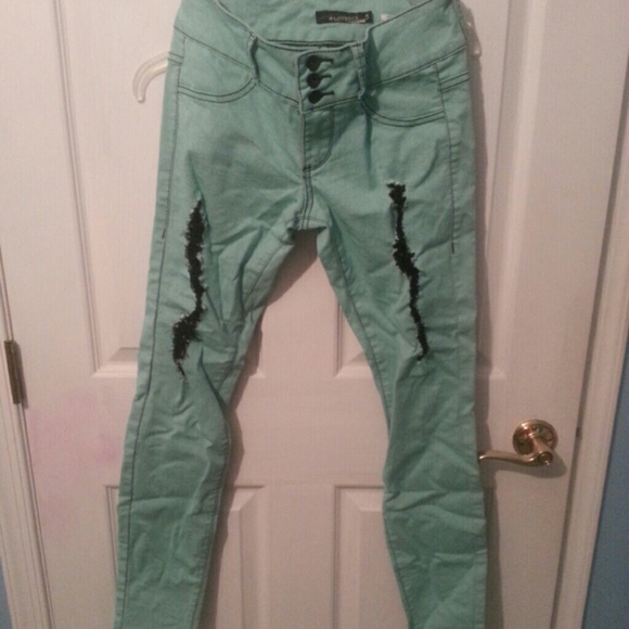 Mint green ripped lovesick super skinny jeans