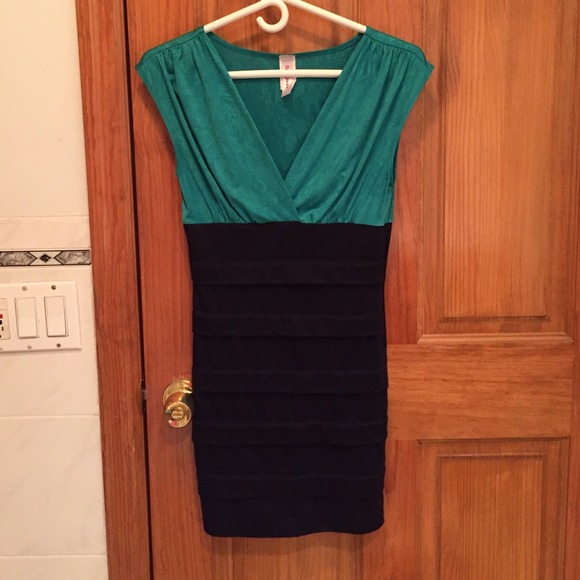NEW PICS 2cute Dress. Deep V Cut.