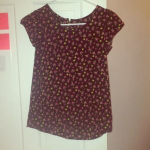 Black short sleeve floral blouse.
