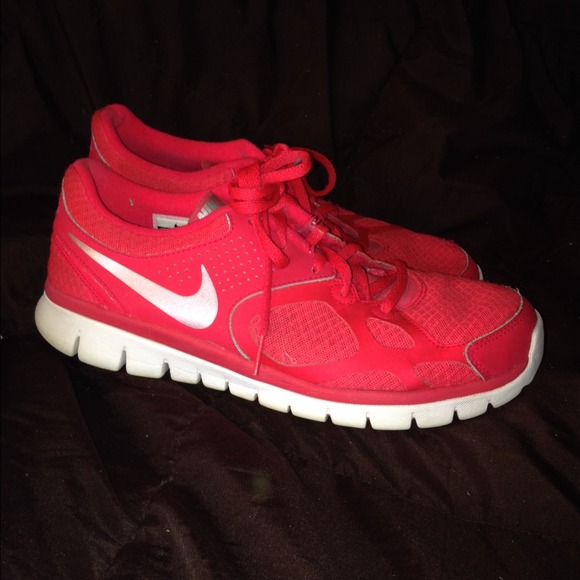 Women's Nikes pink in color