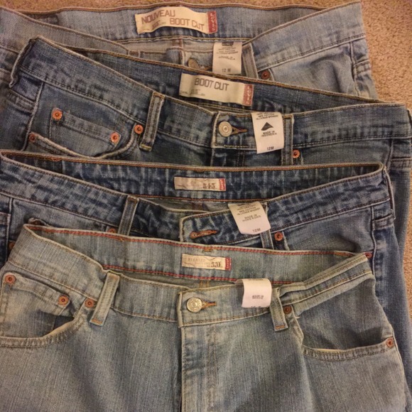 Lot of 4 Levi boot cut jeans,