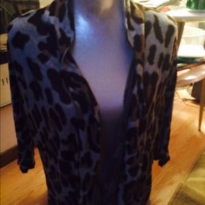 Light blue and brown shirt. Made by Daytrip