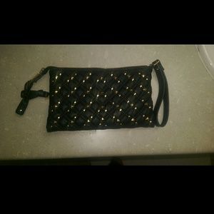 Black studded clutch