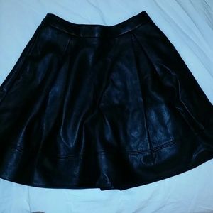Black faux leather circle skirt